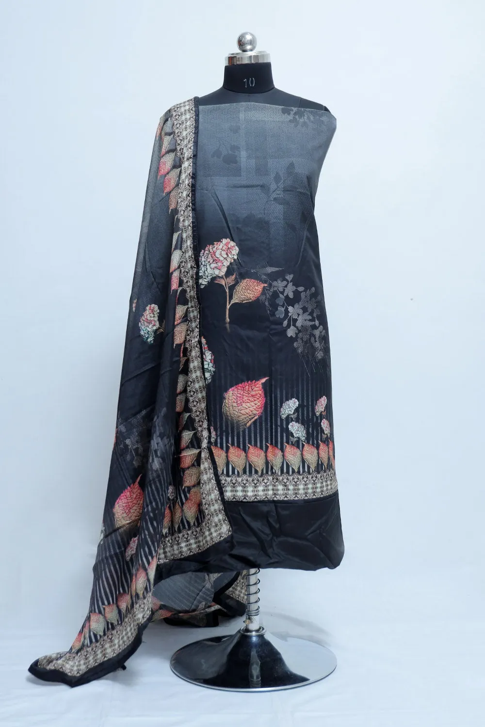 Catchy Coal Black Colour Beautifully Printed Suit  Known For Its Unique Design & Enhances The Personality Of Wearer.